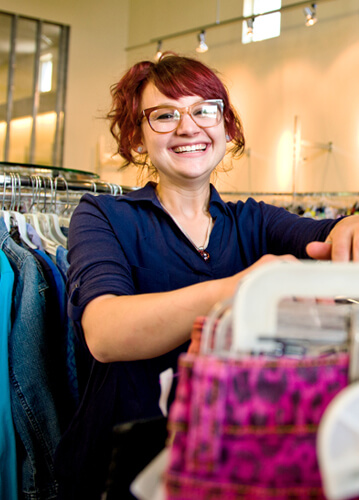 Young Woman in glasses shopping at Goodwill of Central Florida