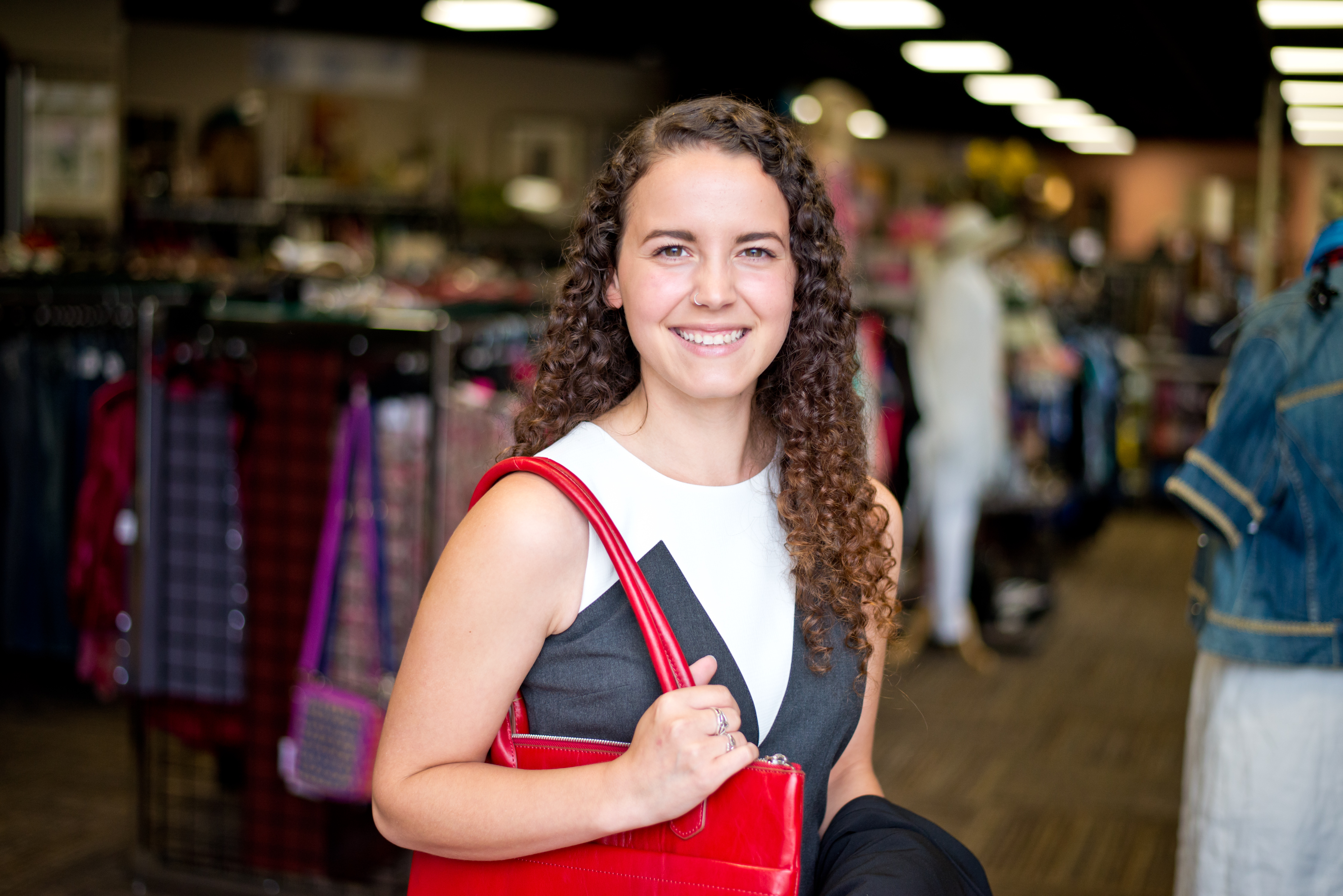 Woman shopping at a Goodwill boutique