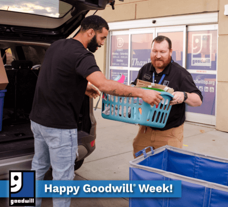 Man dropping off a donation in a blue basket