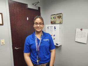 Jasmine at her Goodwill store