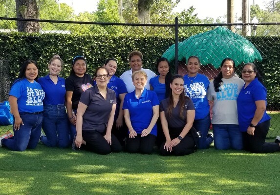 Goodwill Employment Specialist Alba Stone and the women who she has helped find employment at the Apopka Child Academy